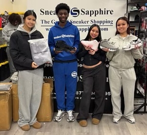 Photo of YouthWorks students working at Sneaker Sapphire